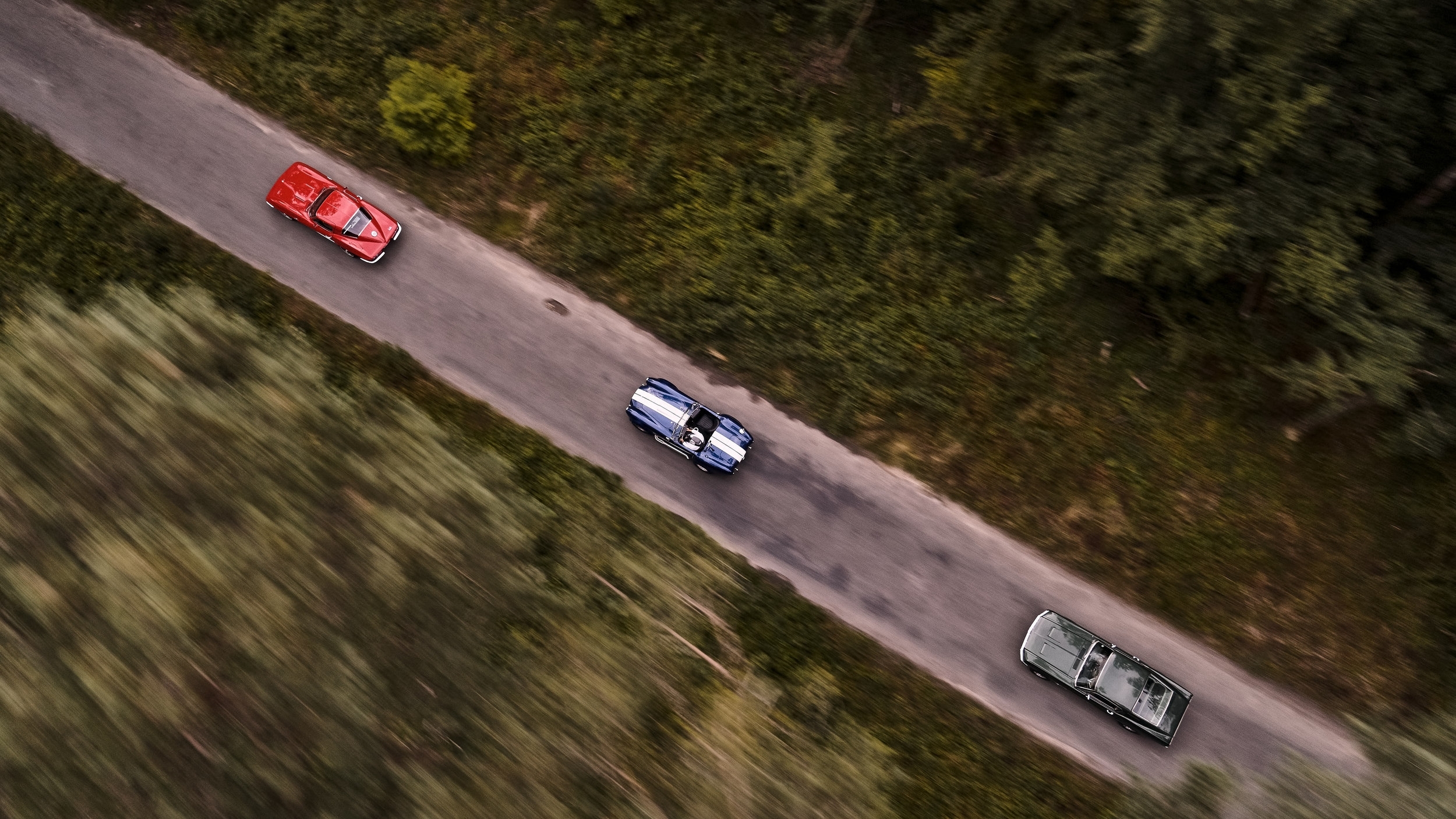 Three icons of the American car culture_Chevrolet Corvette, Shelby Cobra, Ford Mustang (from left to right)_RGB