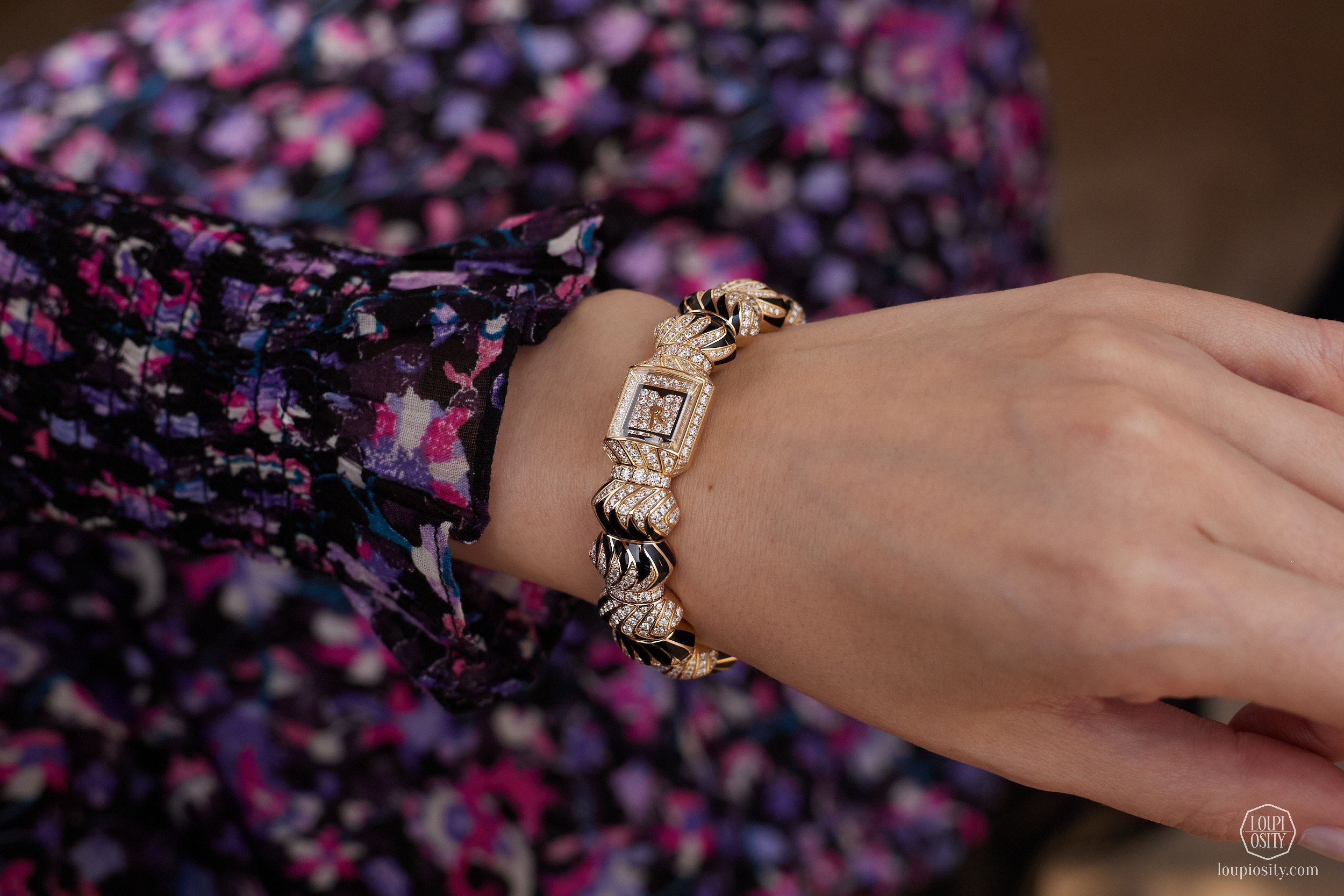 Myst de Cartier at the Watches & Wonders 2026. The yellow gold version features 634 brilliant-cut diamonds (6.13 ct) and lacquered and onyx details.