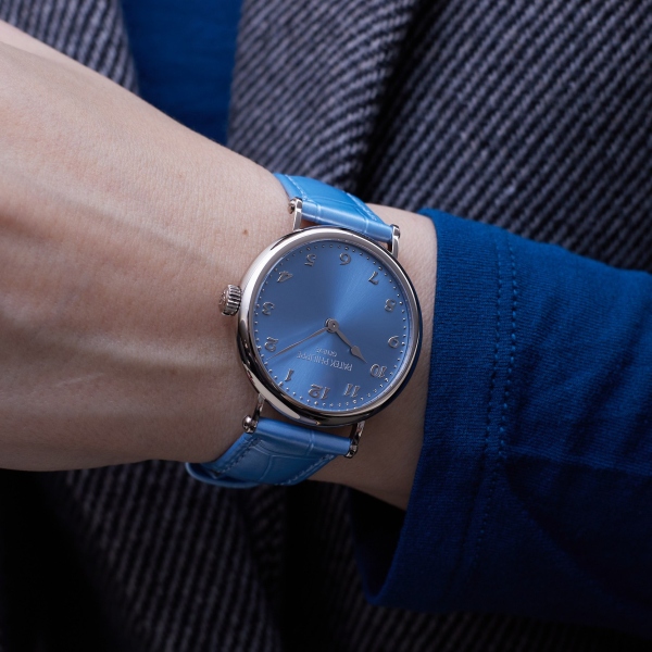 Patek Philippe Calatrava Reference 7200/50G-012 presents an ice-blue sunburst dial paired with a pearlescent ice-blue alligator-leather strap at the Watches and Wonders 2026