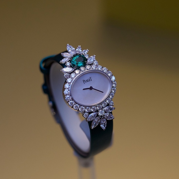 Piaget high jewellery watch with diamonds and emerald