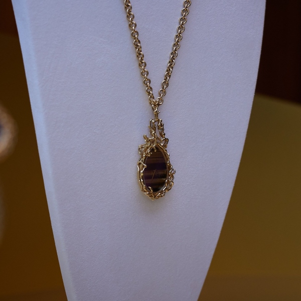 Piaget tiger\'s eye necklace watch