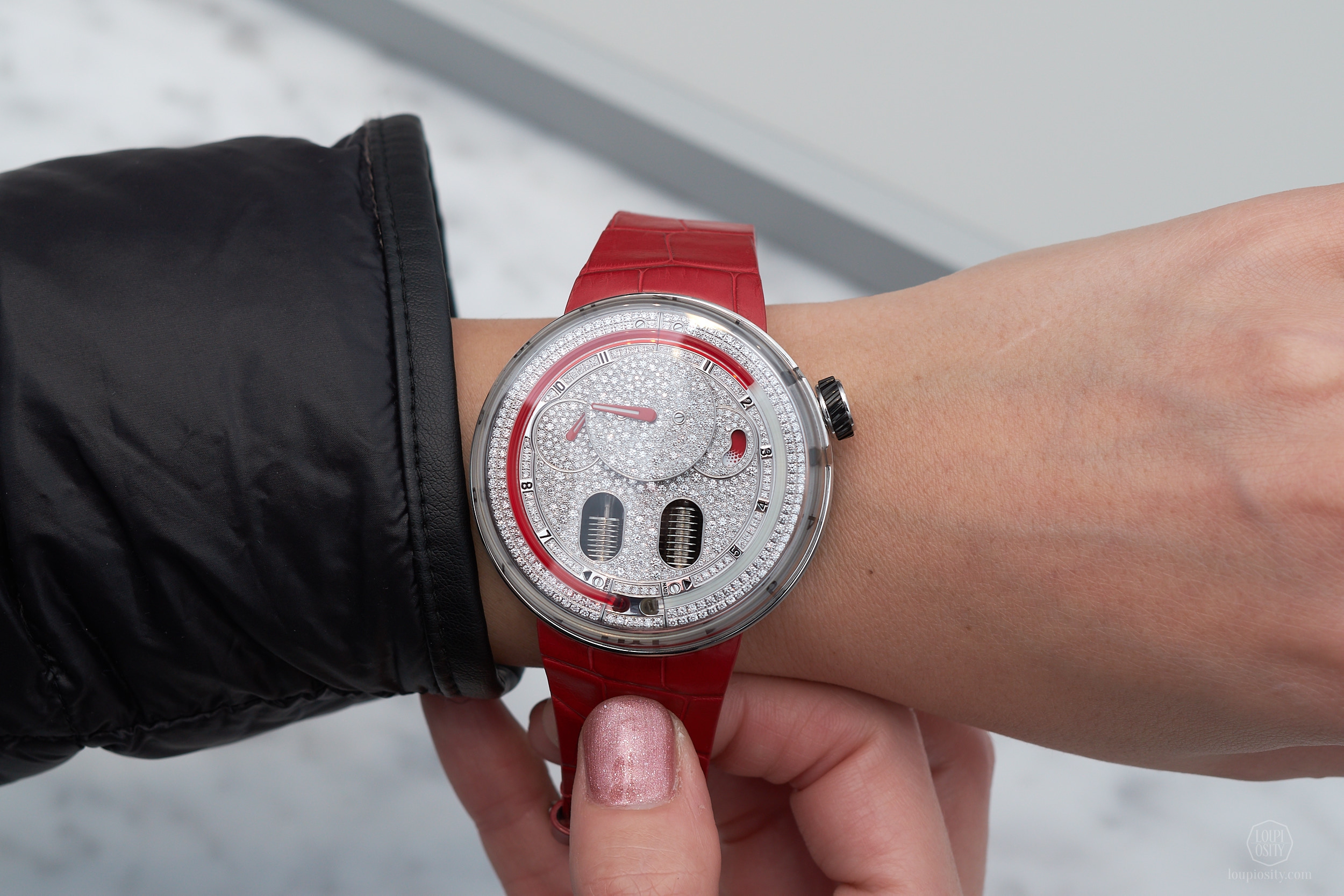 HYT H0 - diamond set red version on the wrist